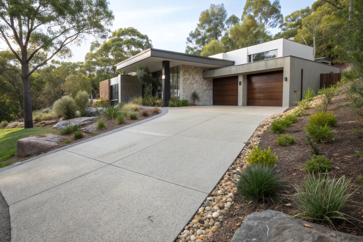 Completed exposed aggregate concrete driveway by Concrete Canberra specialists