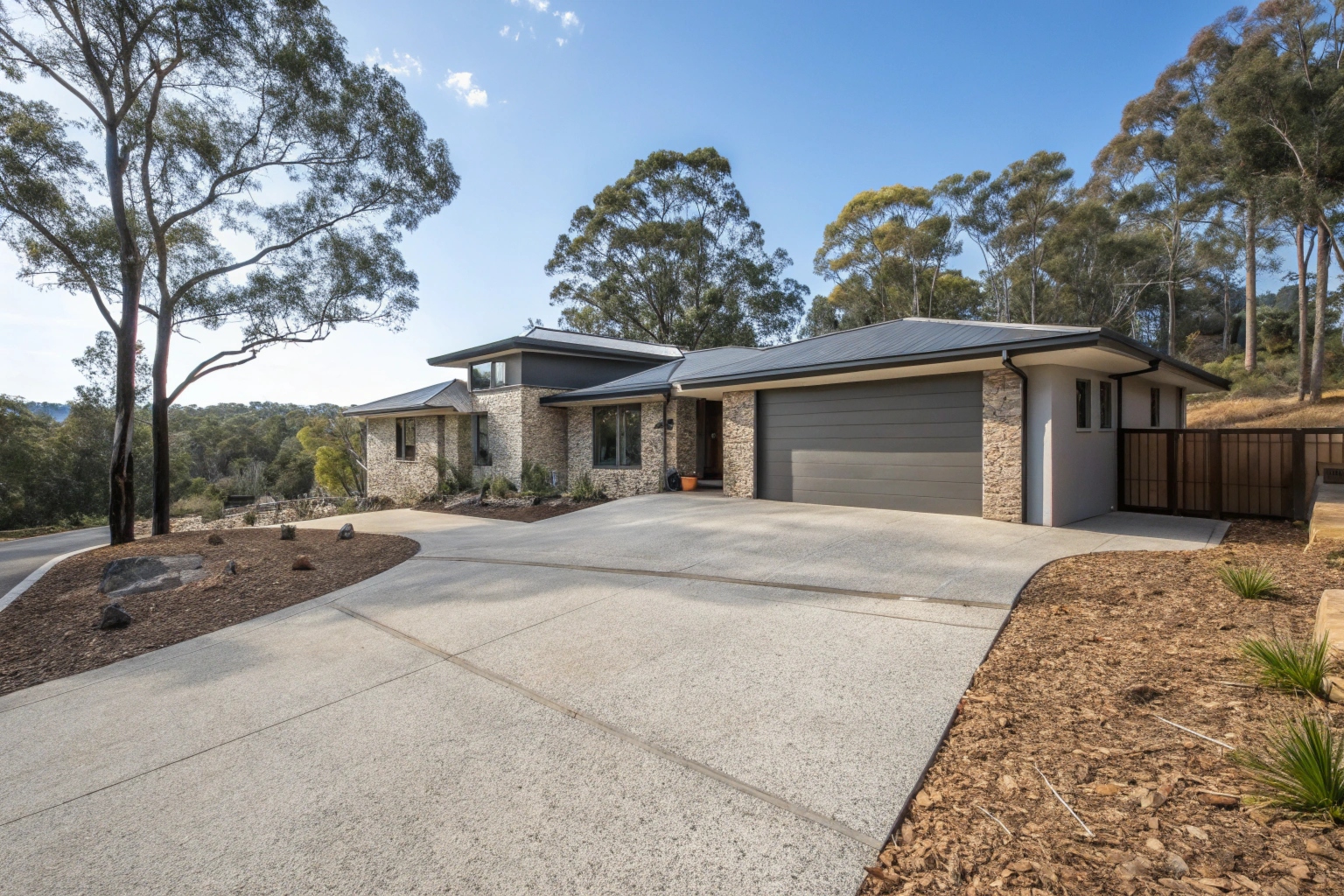 Exposed aggregate concrete driveway at Weston Creek home ACT