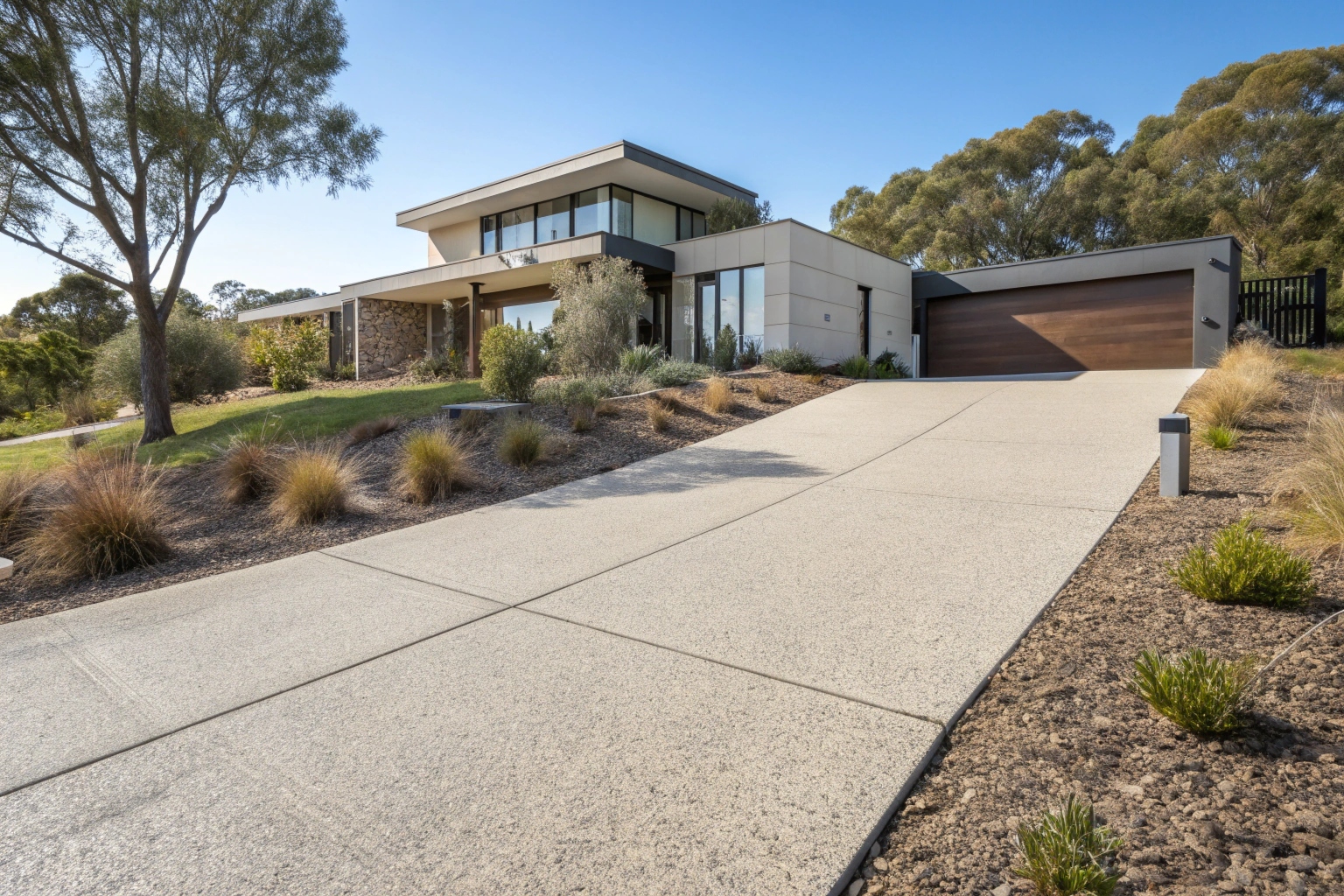 Exposed aggregate concrete driveway Molonglo Valley modern home