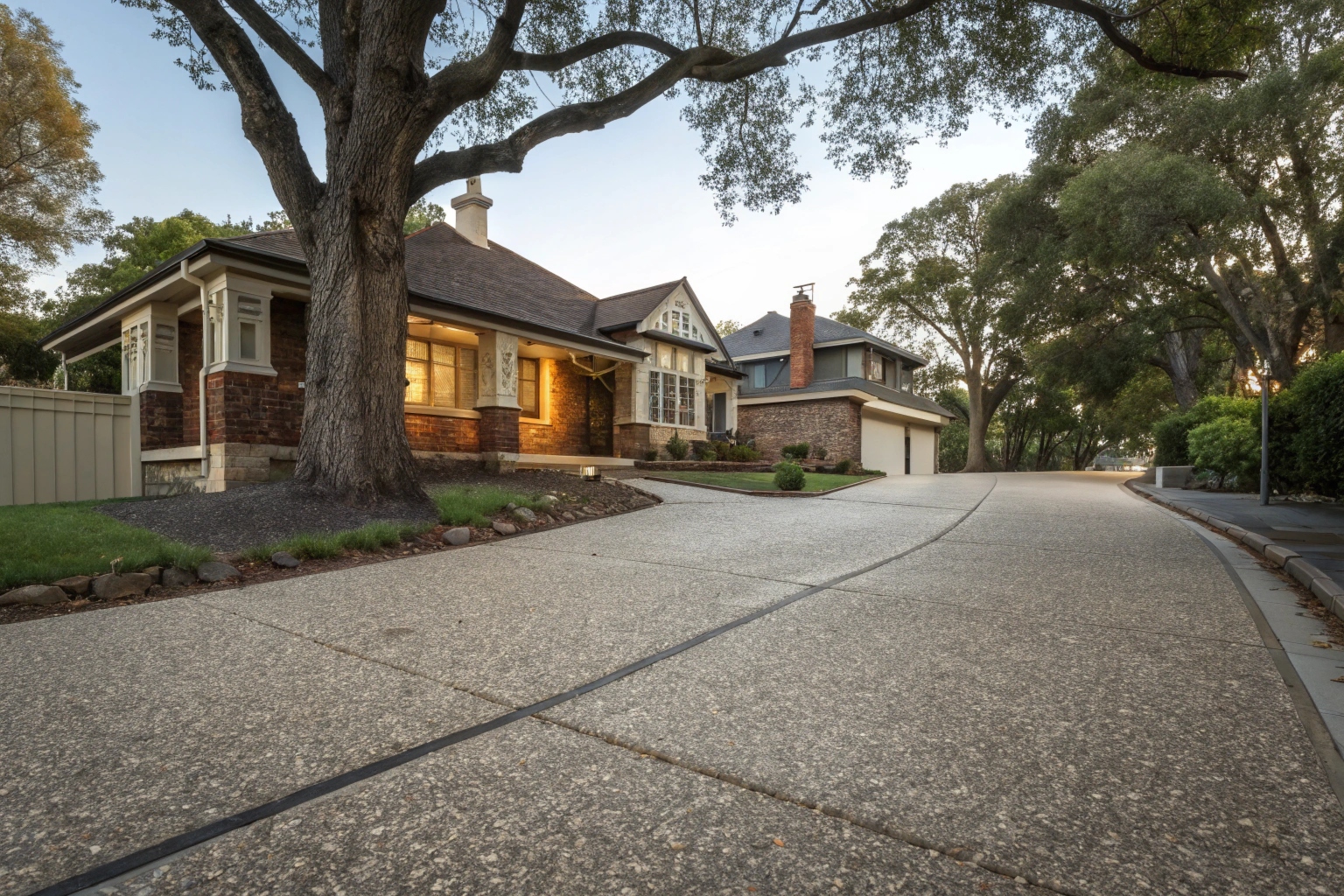 Exposed aggregate concrete driveway Manuka heritage home